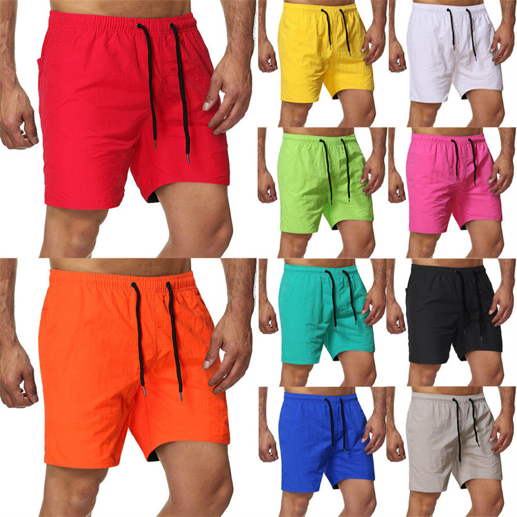 Hot selling summer men's wear shorts candy color capris ten color solid color quick drying beach pants